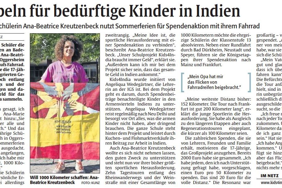 Oggersheimer Sch&uuml;lerin Ana-Beatrice Kreutzenbeck mit Fahrrad und Flagge, die f&uuml;r bed&uuml;rftige Kinder in Indien sammelt.