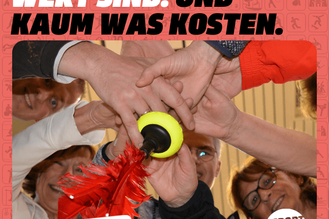 H&auml;nde von mehreren Personen, die einen bunten Spielgegenstand auf einem Tisch halten, vor einer fr&ouml;hlichen Hintergrundatmosph&auml;re.