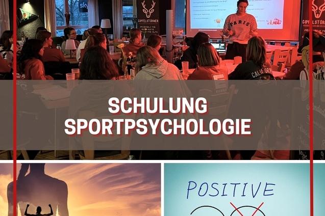 Gruppenschulung zur Sportpsychologie mit Vortragenden und Teilnehmern in einem gut beleuchteten Raum.